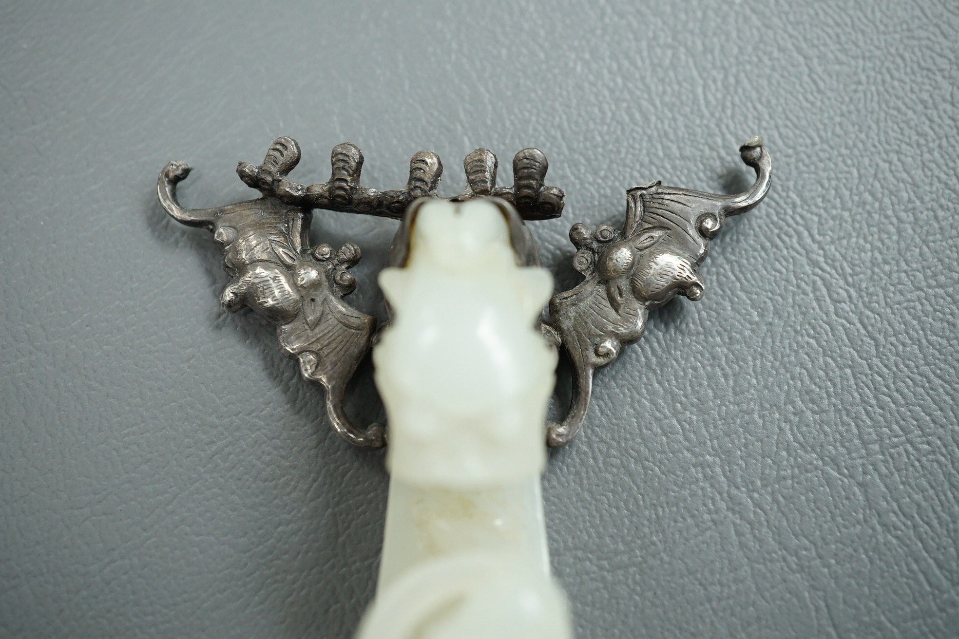 A Chinese jade and cabochon mounted hand mirror, the jade 18th/19th century